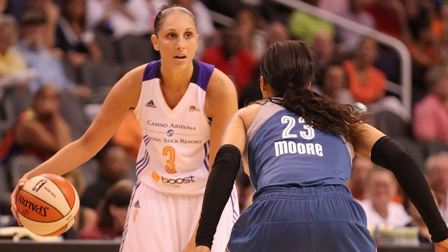 Woman blue uniform basketball crowd free wallpaper - medium preview image