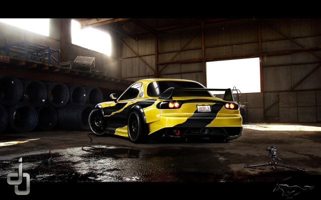 Yellow car garage tires hose free wallpaper - medium preview image