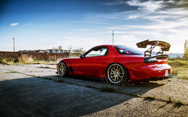 Red sports car parked street #4 free wallpaper for desktop - medium preview image