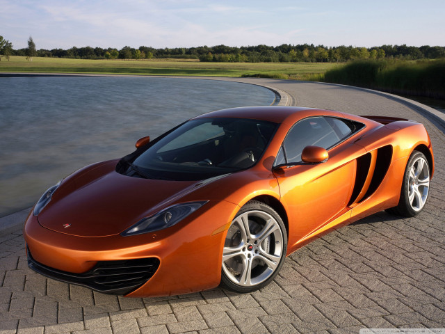 Orange sports car lake brick free wallpaper - medium preview image