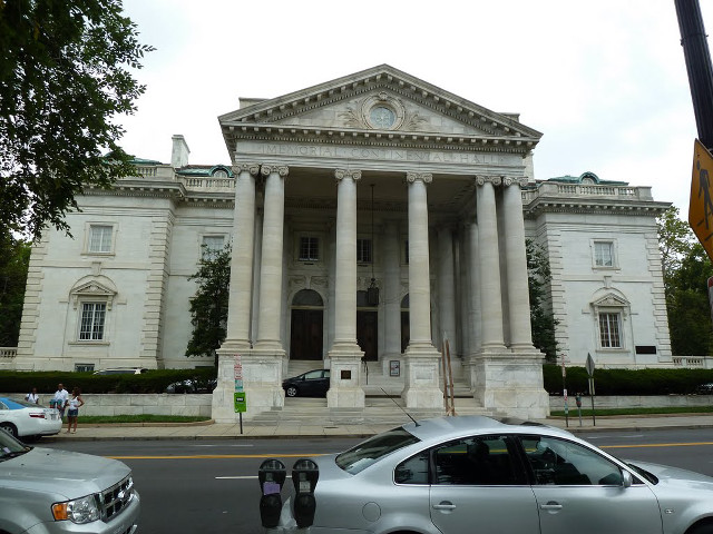 Car parked large building columns free wallpaper - medium preview image