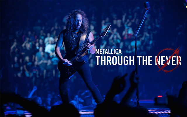 Man playing guitar stage crowd free wallpaper - medium preview image