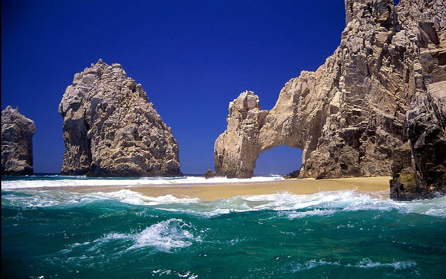 Rock formation ocean beach blue free wallpaper - medium preview image