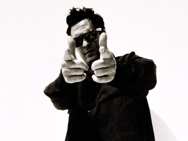 Man black jacket sunglasses hand free wallpaper - medium preview image