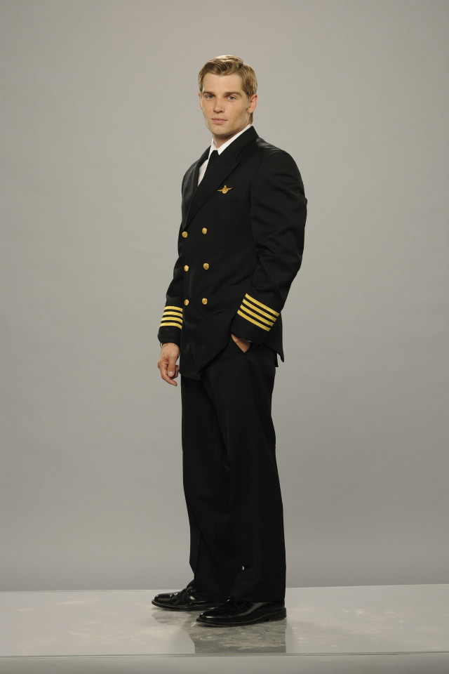 Man black suit gold trim free wallpaper - medium preview image