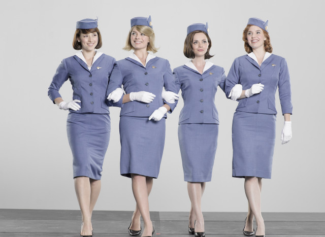 Three women blue uniforms white free wallpaper - medium preview image