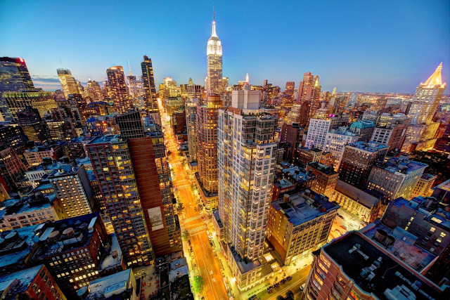 Cityscape tall buildings nighttime lights free wallpaper - medium preview image