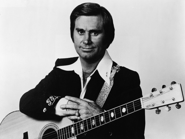 Man holding guitar posing picture #2 free wallpaper - medium preview image
