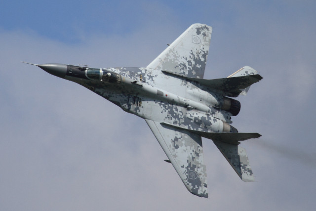 Military jet cloudy sky smoke free wallpaper - medium preview image