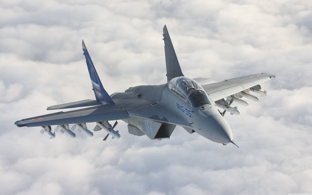 Fighter jet flying clouds sky #2 free wallpaper - medium preview image