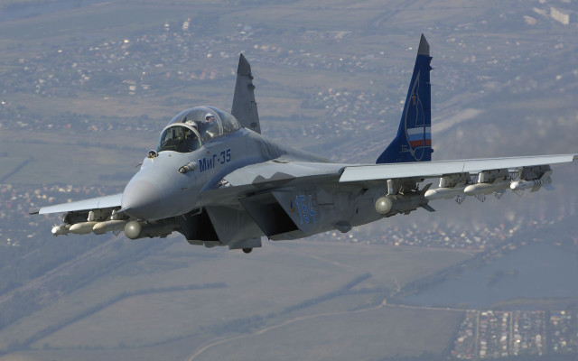 Fighter jet flying air cityscape free wallpaper - medium preview image