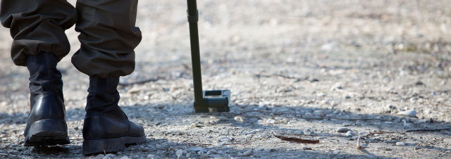 Person walking dirt boots pole free wallpaper - medium preview image