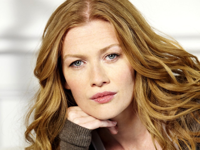Woman red hair sweater hand free wallpaper - medium preview image