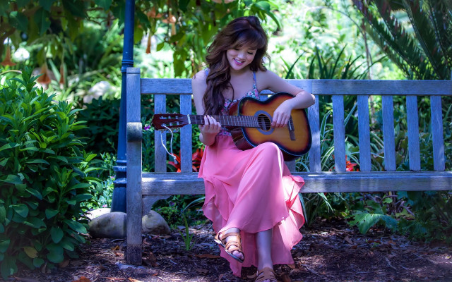 Woman pink dress guitar bench free wallpaper - medium preview image