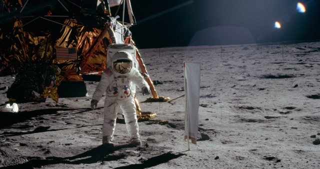 Man white astronaut suit moon free wallpaper - medium preview image