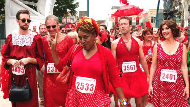 Feminist race group red dresses free wallpaper - medium preview image