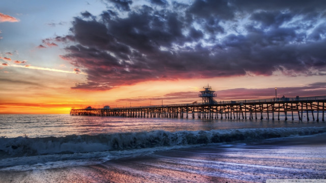 Pier lighthouse sunset ocean waves free wallpaper - medium preview image