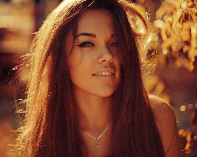 Woman long hair necklace sun free wallpaper - medium preview image