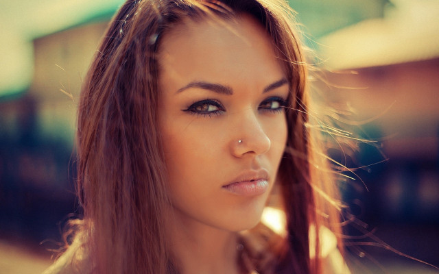 Woman nose ring train background free wallpaper - medium preview image