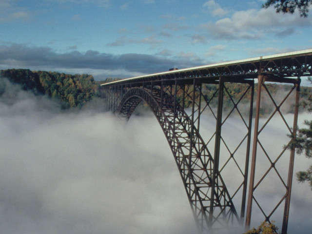 Bridge above clouds trees blue free wallpaper - medium preview image