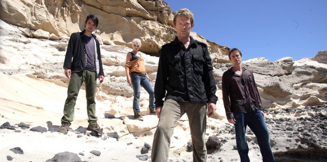 Group people rocky hillside cliff free wallpaper - medium preview image