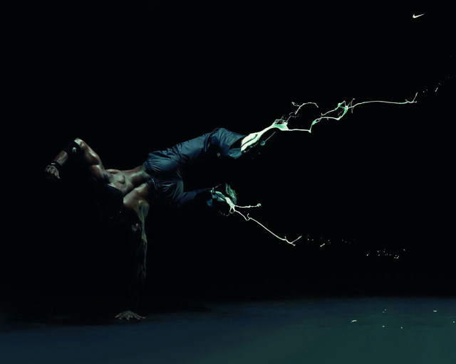 Man handstand dark legs spread free wallpaper - medium preview image