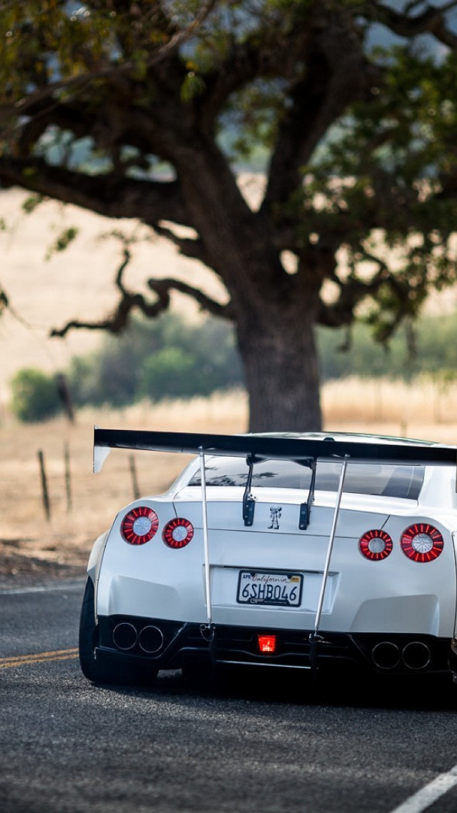 White sports car parked tree free wallpaper - medium preview image