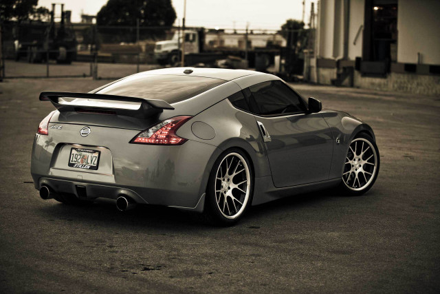 Gray sports car parking lot free wallpaper - medium preview image