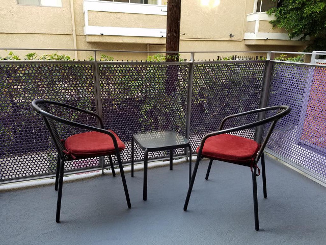 Chairs table balcony fence building free wallpaper - medium preview image