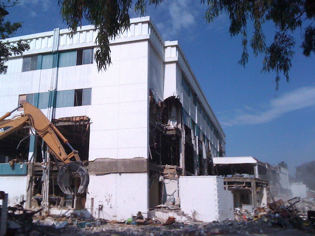 Demolished building bulldozer large window free wallpaper - medium preview image