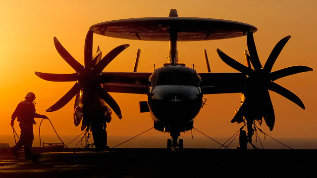 Man propeller plane field sunset free wallpaper - medium preview image