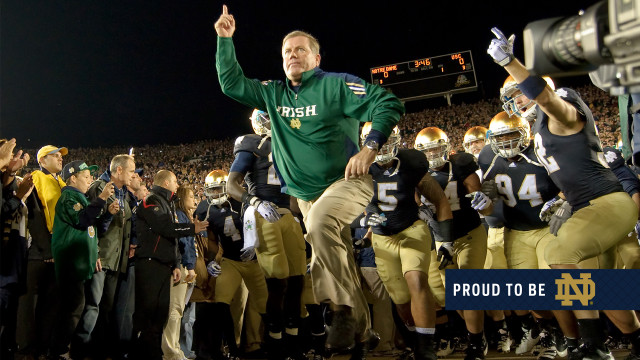 Football player walking field team free wallpaper - medium preview image