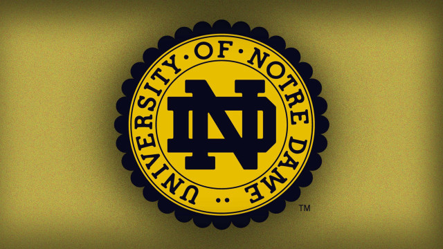 Unc logo wall yellow circle free wallpaper - medium preview image