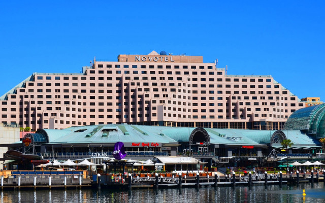 Large building windows water boat free wallpaper - medium preview image
