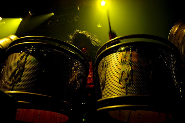 Man playing drums dark room free wallpaper - medium preview image