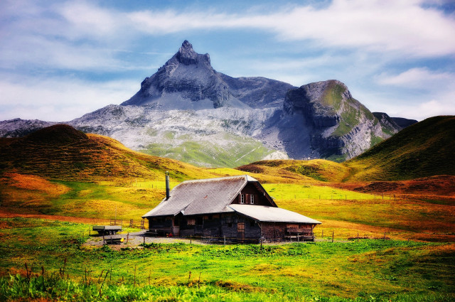 Cabin field mountains blue sky free wallpaper - medium preview image