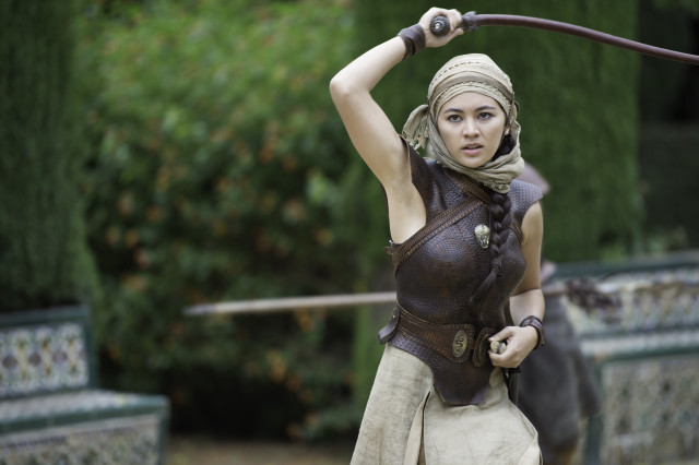 Woman costume sword serious look free wallpaper - medium preview image