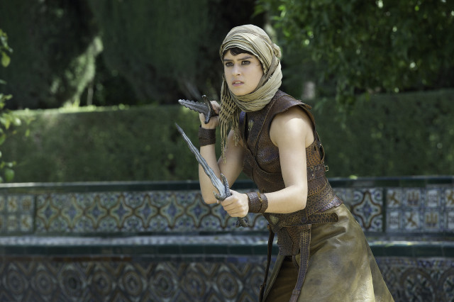 Woman costume sword serious look #2 free wallpaper - medium preview image