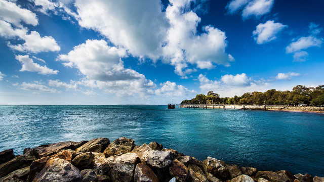 Water rocks pier cloudy sky free wallpaper - medium preview image