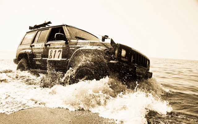 Jeep driving water beach ocean free wallpaper - medium preview image