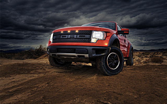 Red truck dirt road cloudy #2 free wallpaper - medium preview image