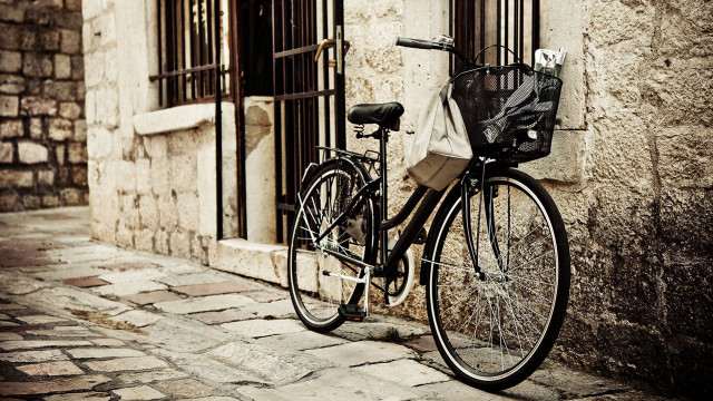 Bicycle building bag shadows sepia free wallpaper - medium preview image