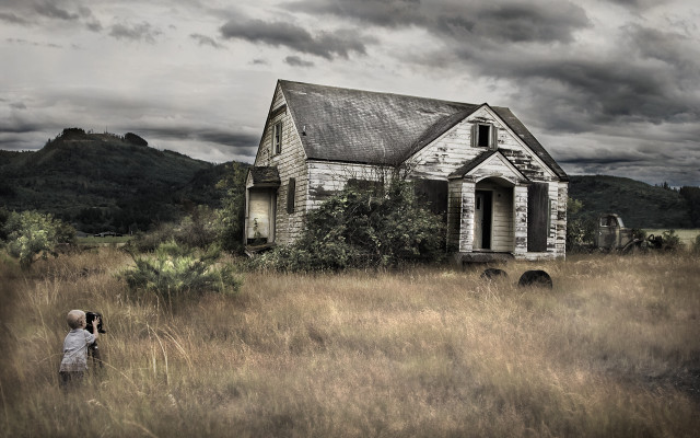 Person taking picture house field free wallpaper - medium preview image
