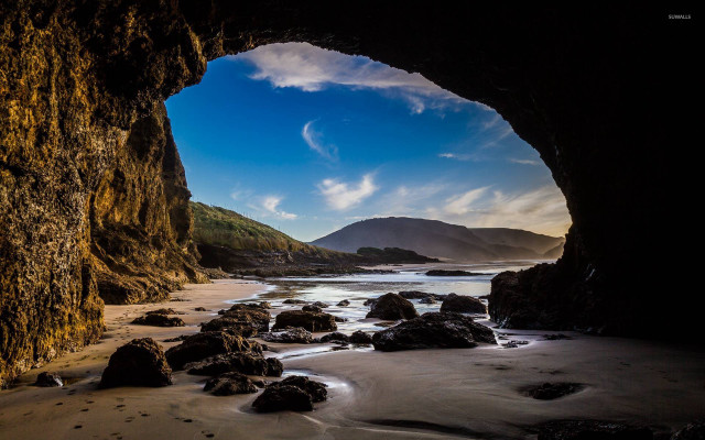 Cave beach mountains sunset blue free wallpaper - medium preview image