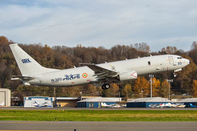 Jetliner flying sky forest trees free wallpaper - medium preview image