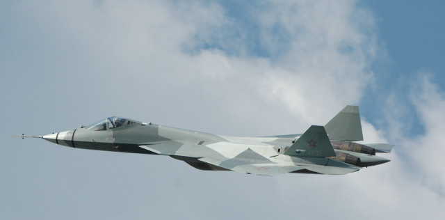 Fighter jet cloudy sky person free wallpaper - medium preview image