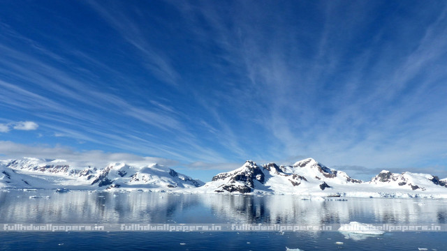 Snowy mountains icebergs blue sky free wallpaper - medium preview image