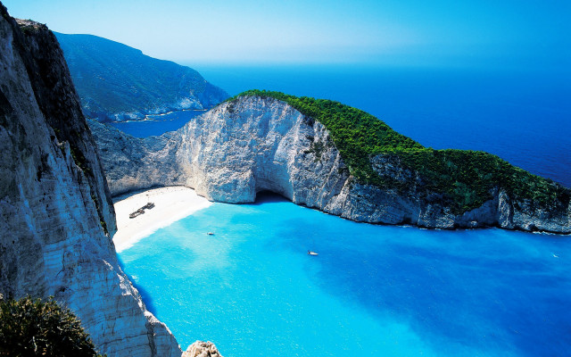 Beach rock formation water scenery free wallpaper - medium preview image