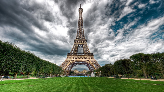 Tall tower cloudy sky grassy free wallpaper - medium preview image