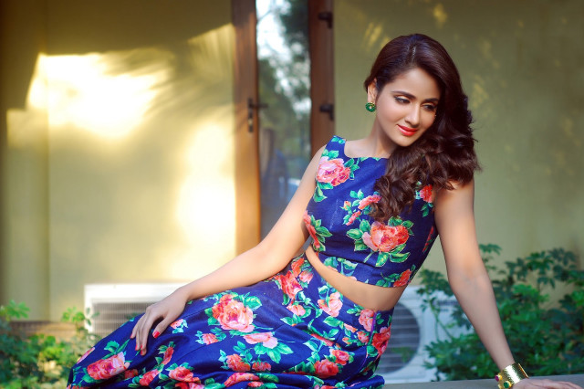 Woman floral dress sitting on free wallpaper - medium preview image